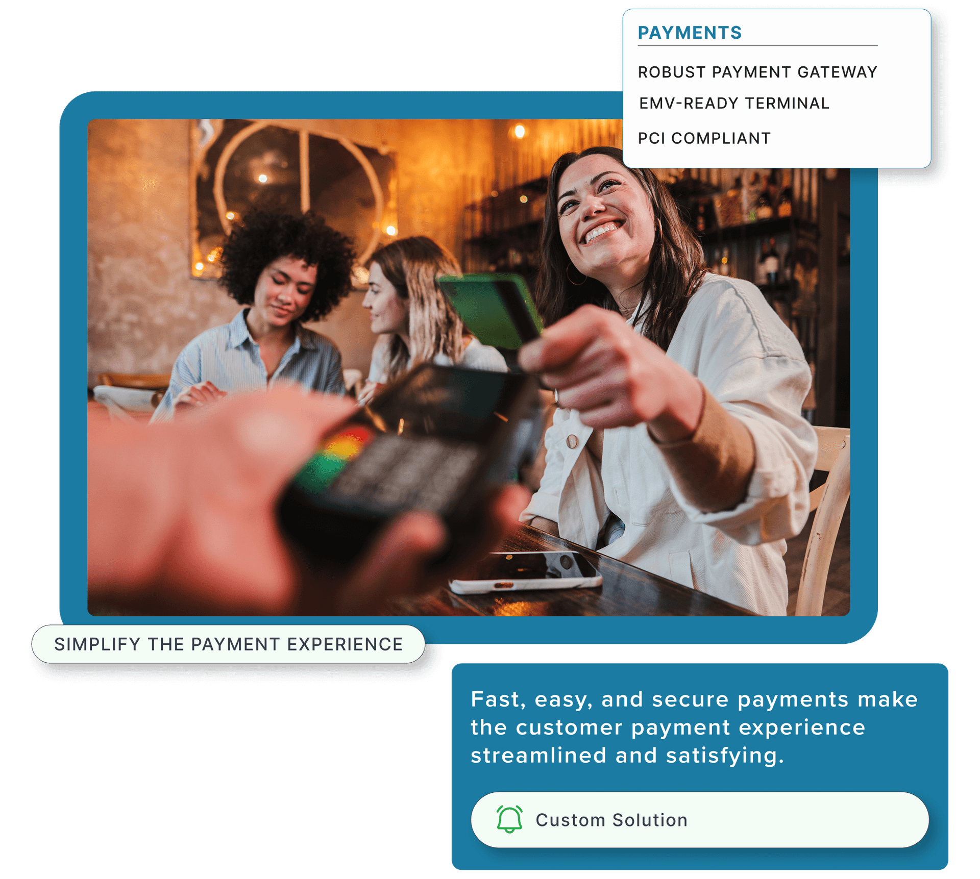 A woman seated at the bar with her friends using a credit card reader to pay for her meal.